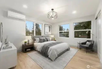 Upper level primary suite with mini-split heating/cooling system & 8 ft ceilings.