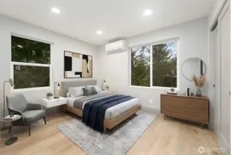 Upper level 2nd bedroom with mini-split heating/cooling system & 8 ft ceilings.