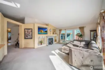 Built ins for your storage or display surround the coze gas fireplace