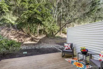 Deck Off Kitchen Backs To Lush Greenbelt