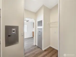 Functional laundry room with added storage and flexible space for a pantry cabinet, extra refrigerator, or freezer.