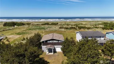 A stunning oceanfront home featuring breathtaking views of the Pacific and rich Lindal cedar finishes throughout. Warm wood tones, expansive windows, and thoughtful architectural details create a seamless blend of coastal elegance and natural beauty—offering an inviting retreat with timeless charm.