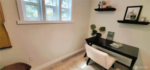 A stylish first-floor bathroom featuring carefully selected designer colors that enhance the space with warmth and sophistication.