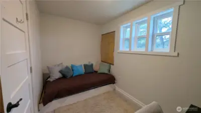 A stylish first-floor bathroom featuring carefully selected designer colors that enhance the space with warmth and sophistication.