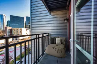 Wonderful private covered deck to relax & enjoy the city lights.