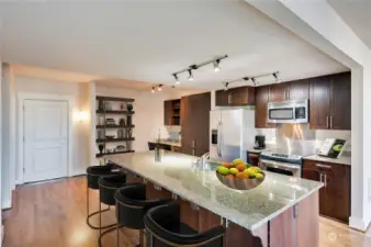 Another photo of the stunning kitchen & built-in desk for ideal workspace in the home.