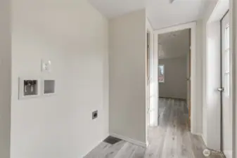 Laundry in the hall with bath down & to the left & primary at the end of the hall