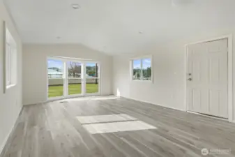 living & entry near the hall.  Can lights with a separate light at the door.