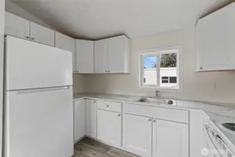 all new kitchen.  Lower left corner Lazy Susan cabinet.