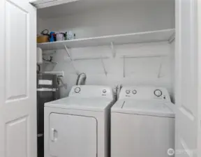Laundry area with new hot-water tank