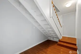 Create a reading nook or build storage drawers under the steps.  Creativity is waiting.
