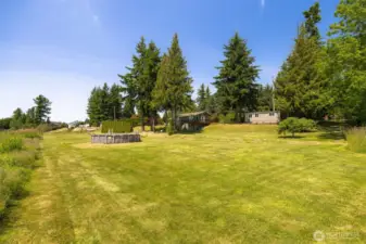 Flat space for playing your favorite yard games, pool, additional parking for those Extra guests who show up just because