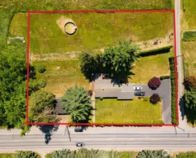 Boundary stakes are set at SE and SW corners.  Owner mows the portion in the corner and parks a vehicle if needed.