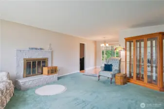 Walking in to see plenty of room to visit - and a view of the door to another Living area ...