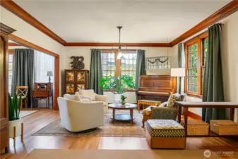The open main floor is grand, with cozy gathering spaces.