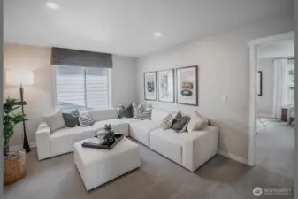 Open loft on upper level. Photos not of this home