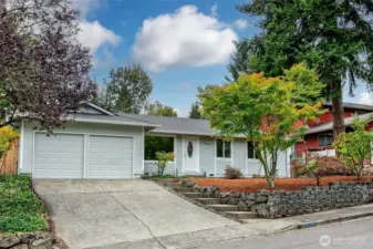 Front of home with lots of parking