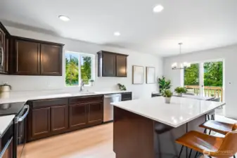 Photographs are for illustrative purposes only. Features, finishes, interior/exterior colors, landscaping and floorplan shown may vary from actual homes built.