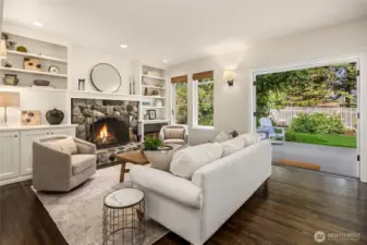 The family room with wood burning fireplace.