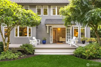 Mature plantings and trees anchor the back yard.