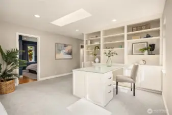 The upper level with built-ins. The desk can be removed and just be shelving.