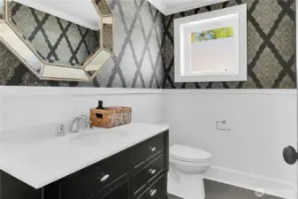 Convenient main-floor bathroom thoughtfully designed for guests and everyday use.