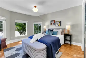 Large upper-floor guest bedroom offering comfortable space and added privacy.