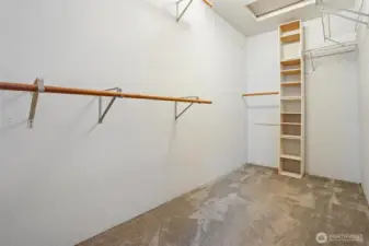 Huge walk-in primary closet.