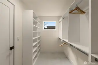 Primary suite walk-in closet.
