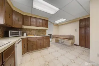 Charming built-in breakfast nook and there's a Dutch door to the garage