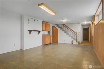 Basement bonus room with a wet bar