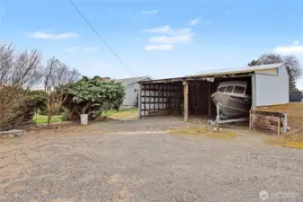 Overside carport off the back of the shop