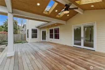 Easy Access to the rear Deck from the Living Room (right French Doors) and Kitchen (left single door).
