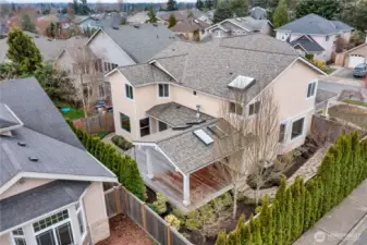 Yard has been professionally landscaped and maintained with flagstone walkways and standoffs for future yard lights.