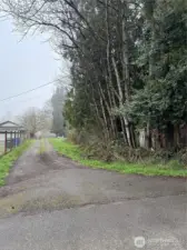 Drive way to enter 3320 and back of 3312