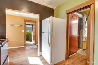 From the kitchen head directly into the 3/4 bath or back toward the pantry, laundry, and mudroom.