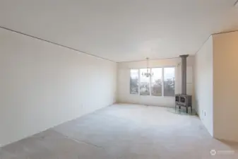 Primary bedroom with woodstove