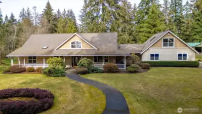 Welcome to 6170 Rutsatz Road - a 7.3 acre equestrian estate nestled on the Nooksack River, surrounded by the Cascade foothills.