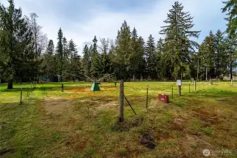 Over half of the property is electric fenced, plus there is a powered rotating walker for horses. Heated water troughs in the fenced area too.