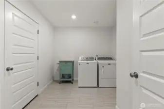 Utility room with door to garage