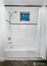 Two bedrooms with oversized windows and walk in closets are ideally positioned on opposite corners of the home for privacy —the owner’s suite with en suite bath and a second bedroom plus additional full bath.