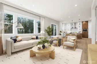The living area looks out to a verdant greenbelt area!