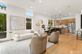 Lovely wide planked engineered hardwoods throughout the main living level. The chef kitchen has an island kitchen. Not shown in the photo, there's also a half bath and sitting nook area on the main floor.
