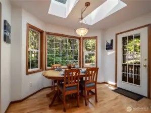 Enjoy dining with a view to the woods behind you where you can see deer, raccoons, and many birds.