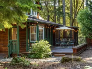 The back deck is perfectly set up for dining and entertaining.