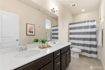 Hall bathroom for guest bedrooms with double sinks