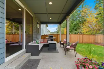 Covered porch makes a comfortable outdoor living space.