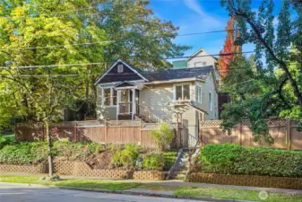 This home sits perched above the street and is fully-fenced, providing a wonderful in-city oasis.