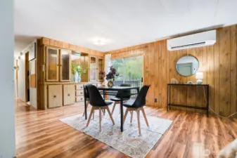 Dining room with sliding glass door and built ins