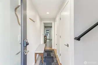 Enter to a wide entryway with large storage closet